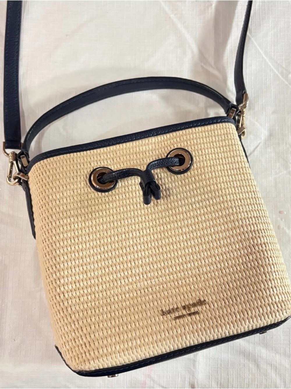 Kate Spade Woven Straw Crossbody Bucket Bag with Navy Trim